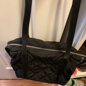 Vintage Prada nylon with leather trim. Vintage circa 1999 not sold in US.